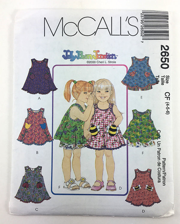 McCalls 2650 Girls Dress and Shorts Sewing Pattern with animal pockets